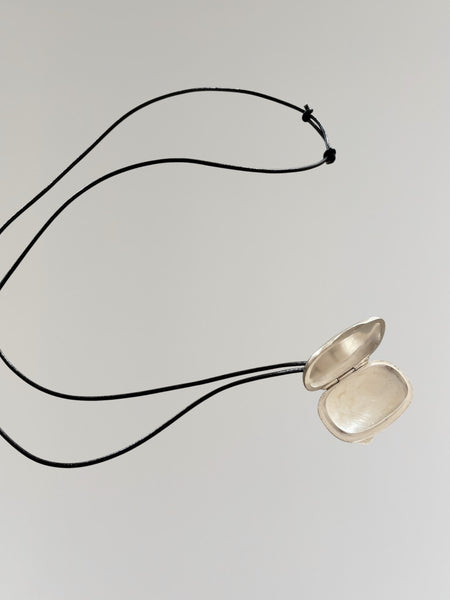 HERMÈS SILVER PILL BOX PENDANT NECKLACE