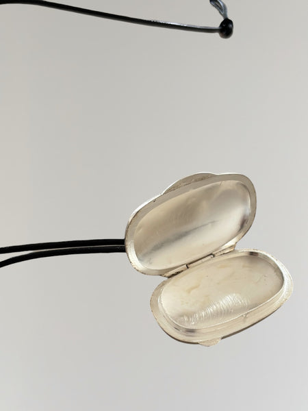 HERMÈS SILVER PILL BOX PENDANT NECKLACE